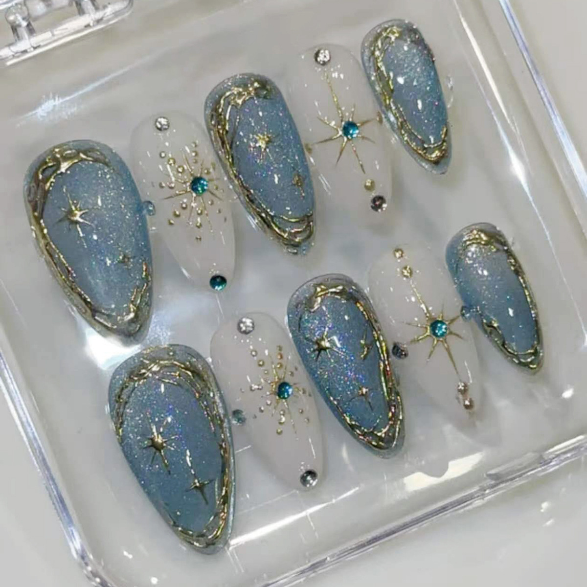 Nail Art Overlay - 24 szt. Złocone, brokatowe, zdobione gwiazdkami